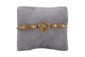 Glorious Gold Om Diamond Rakhi